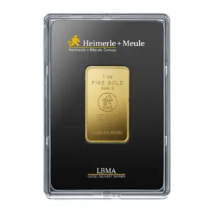 1 Unze Goldbarren von Heimerle + Meule sicher verpackt in einer schwarzen Kapsel mit LBMA-Zertifikatshinweis.
